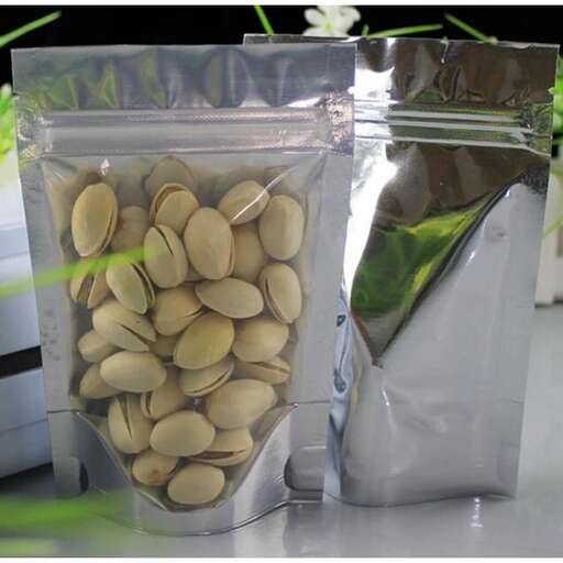 a plastic container filled with lots of food.