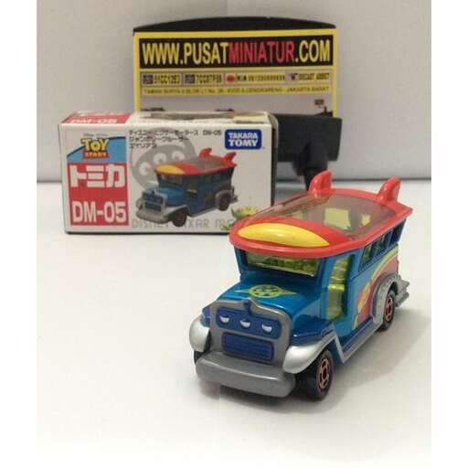 a toy car with a car on top of it.