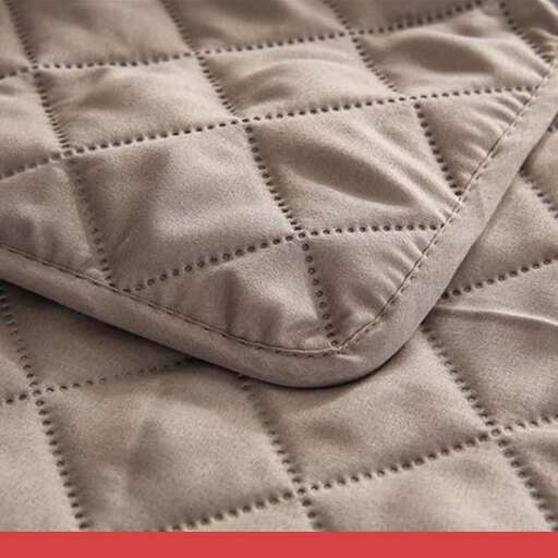 a close up of the quilted blanket.