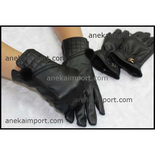 a pair of black leather gloves with a black glove.