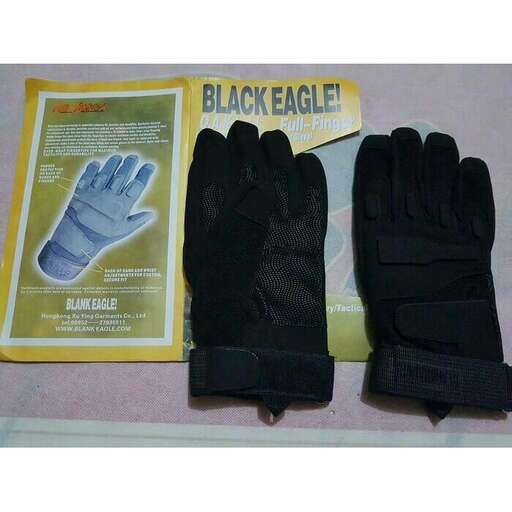 a pair of gloves and a glove on a table.