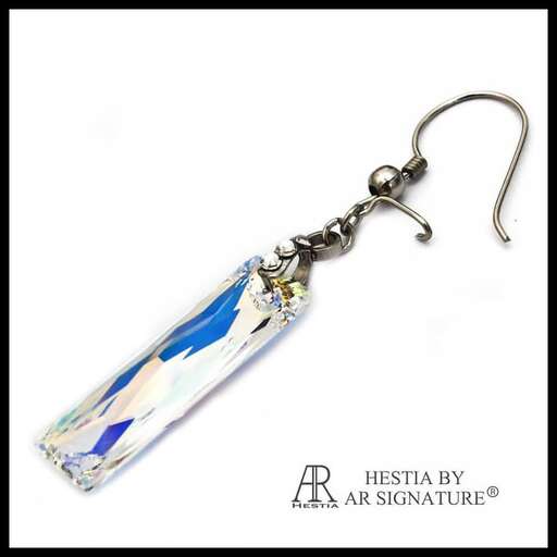 a dichroic glass pendant set in sterling silver