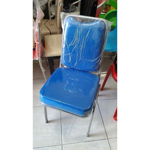 a chair that is sitting in a room.