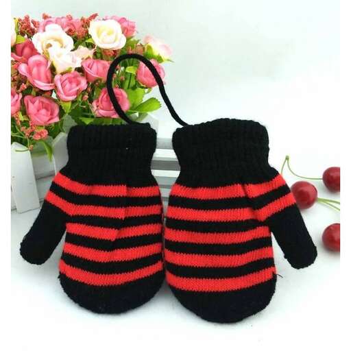 two little black teddy bears wearing red and black striped sweaters.