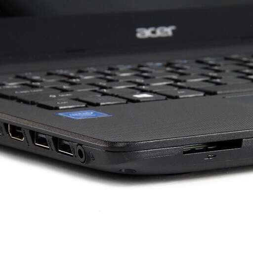 a laptop computer with a blue logo on it.