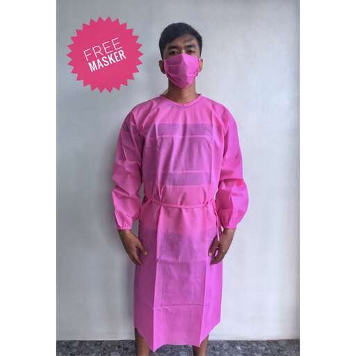 a pink silk cotton dress with a pink mask