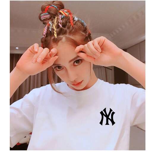 a girl with a flower in her hair