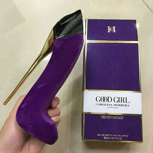 a purple and gold box with a pair of scissors.