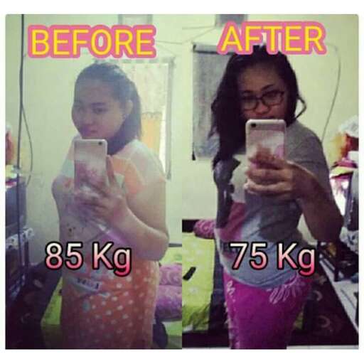 a girl taking a picture of herself with a cell phone.