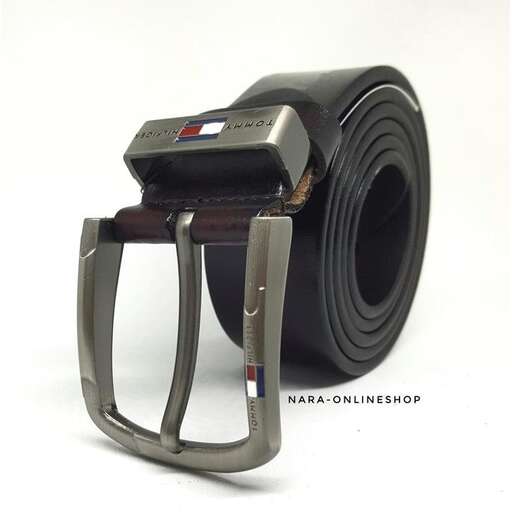 a camera with a roll of tape on it.