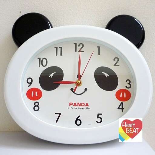 a clock with two black and red numbers on it.