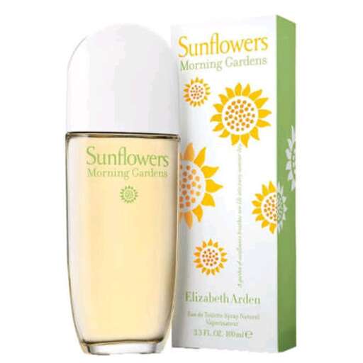 a glass of white wine with a beautiful sunflower design