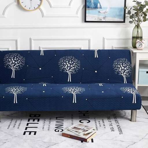 a blue sofa with a white and grey pattern.