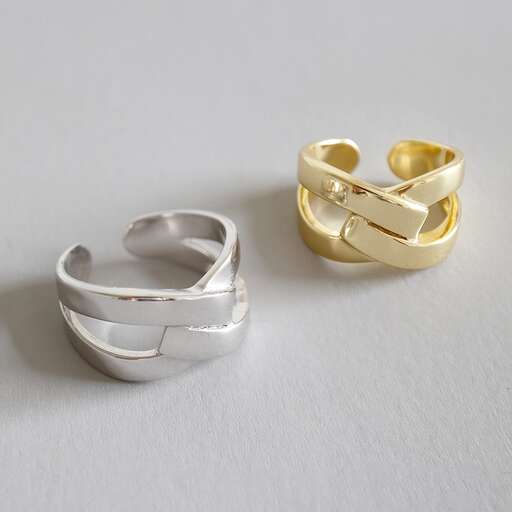 a pair of gold rings, with a white background.