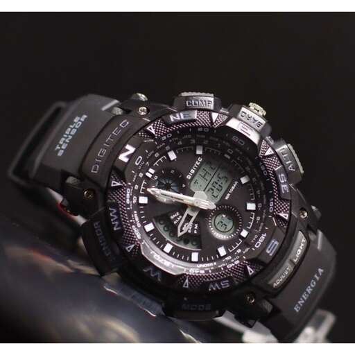 a watch that is on a black surface.