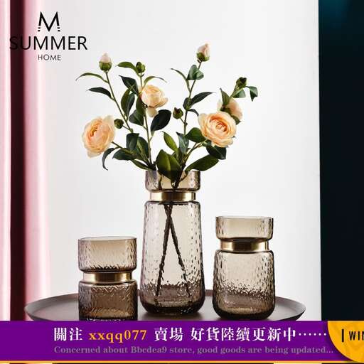 a picture of a vase with flowers in it.