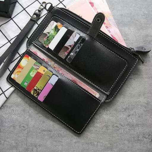 a black purse with a wallet on it