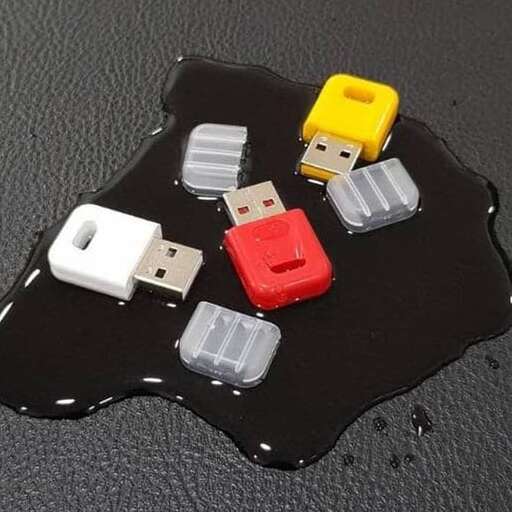 a group of legos sitting on top of a black surface.