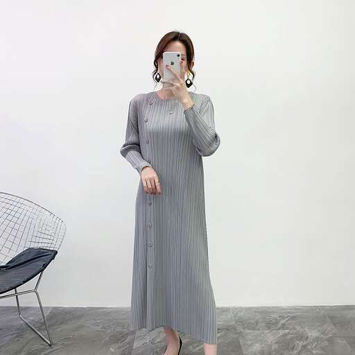 a long dress with a long sleeved shirt and a long skirt.