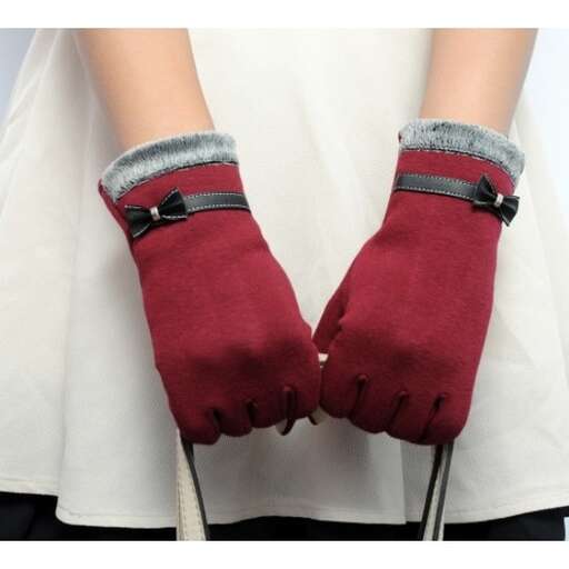 a pair of red gloves with black straps.