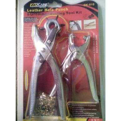 a pair of scissors sitting on top of a box.