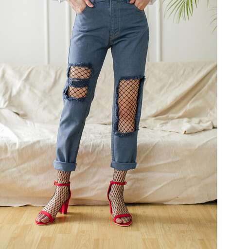 jeans with a red lace up top.