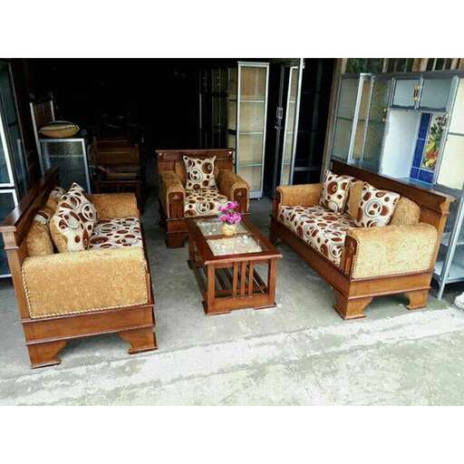 a couple of chairs sitting on a porch.
