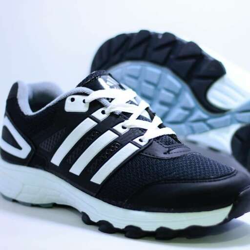 a pair of shoes with a white sole