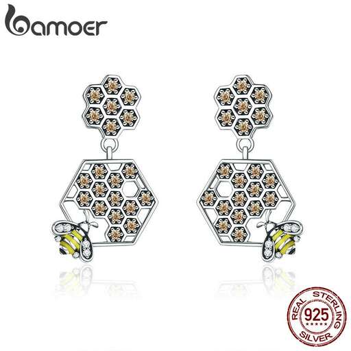 these earrings are made with a pair of gold and black.