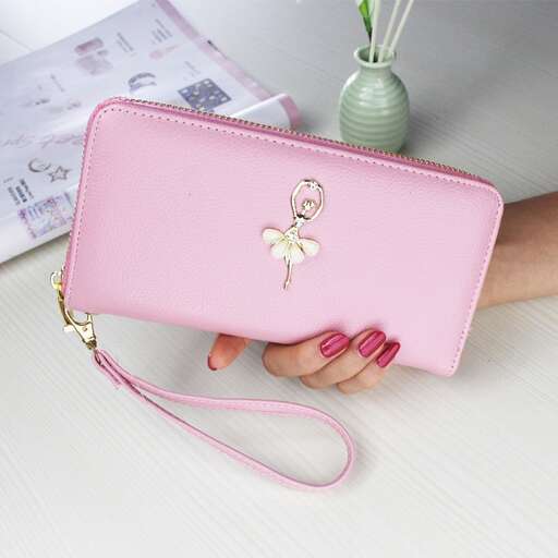 pink handbag with a flower on the side