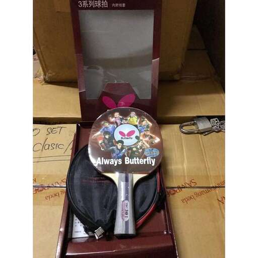 a box with a pair of scissors in it