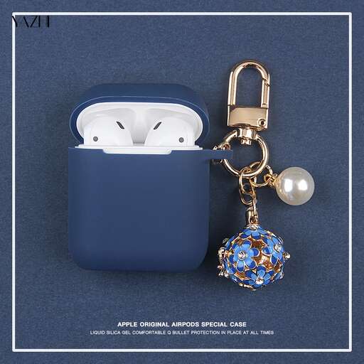 a blue case with a keychain and a keychain.
