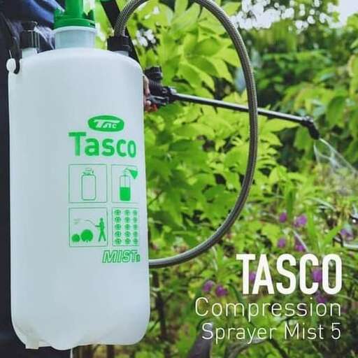 a water bottle hanging from a hose.
