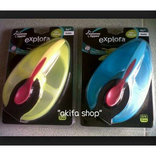 two colorful headphones for sale in a store.