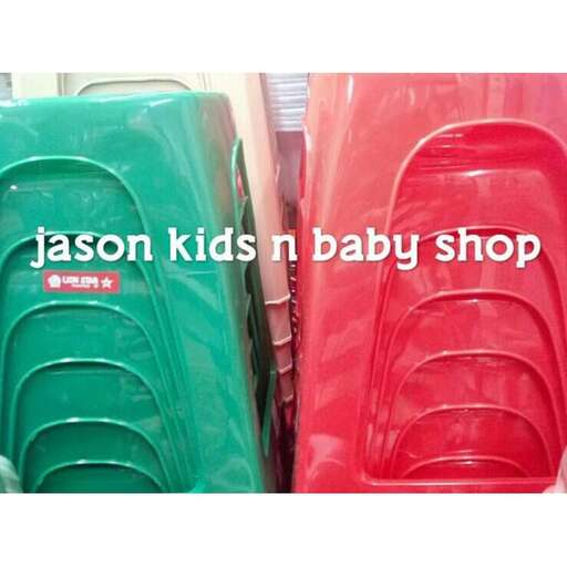 a set of red and green baby chairs