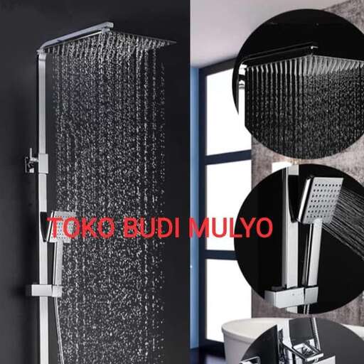 a shower head with a shower head and a mirror.