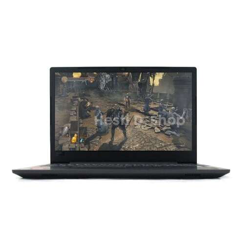 a laptop computer with a game on the screen.