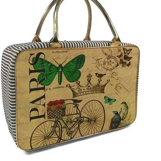 a purse with a bicycle on it and a bicycle on the side.