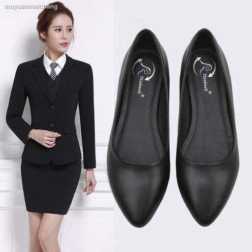 a woman in a suit and tie