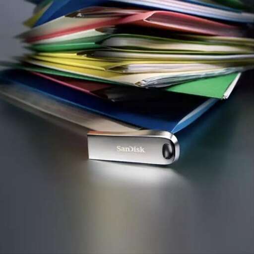 a stack of papers sitting on a table.