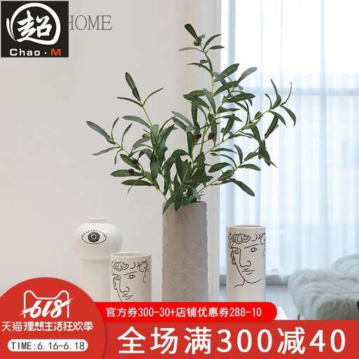 a plant in a vase sitting on a table.