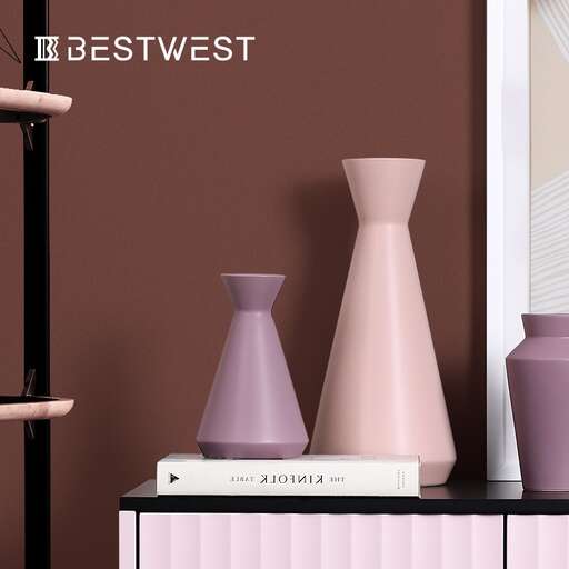 a couple of vases sitting on a shelf.