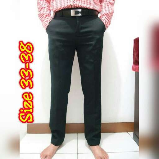 a pair of black jeans with a red and white checkered shirt.