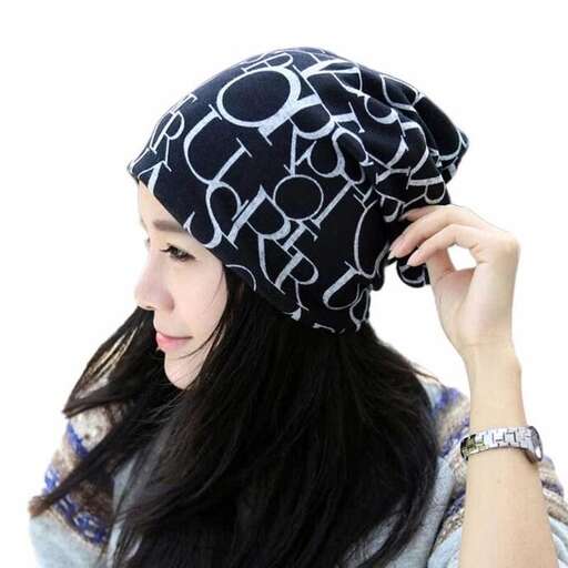 a black and white beanie with a white pattern.