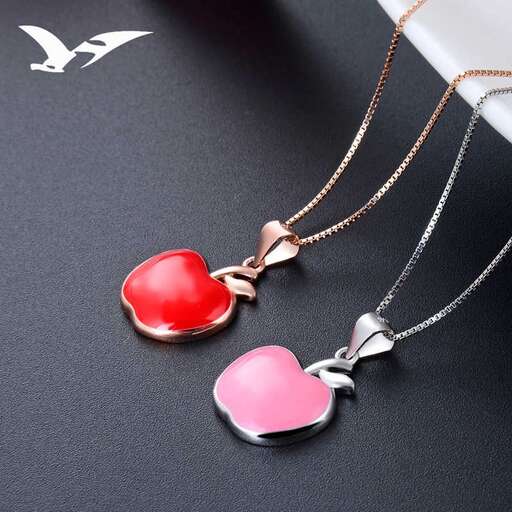 a necklace with a heart and a heart.