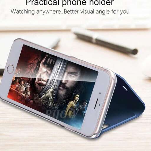 a cell phone with a picture of a man holding a phone.