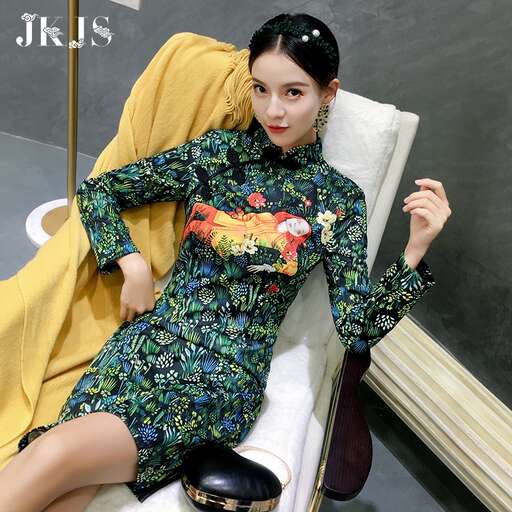 a model in a green dress and black shoes