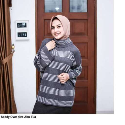 sweater with a scarf on it