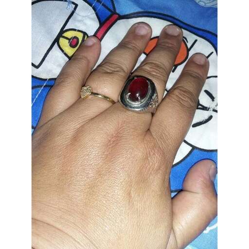 a ring with a diamond on it.