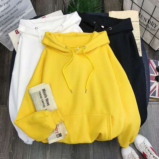 the jacket is a bright yellow with a white collar and white sleeves.